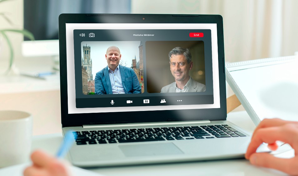 A laptop showing an image of the two speakers of the Motisha webinar series. 